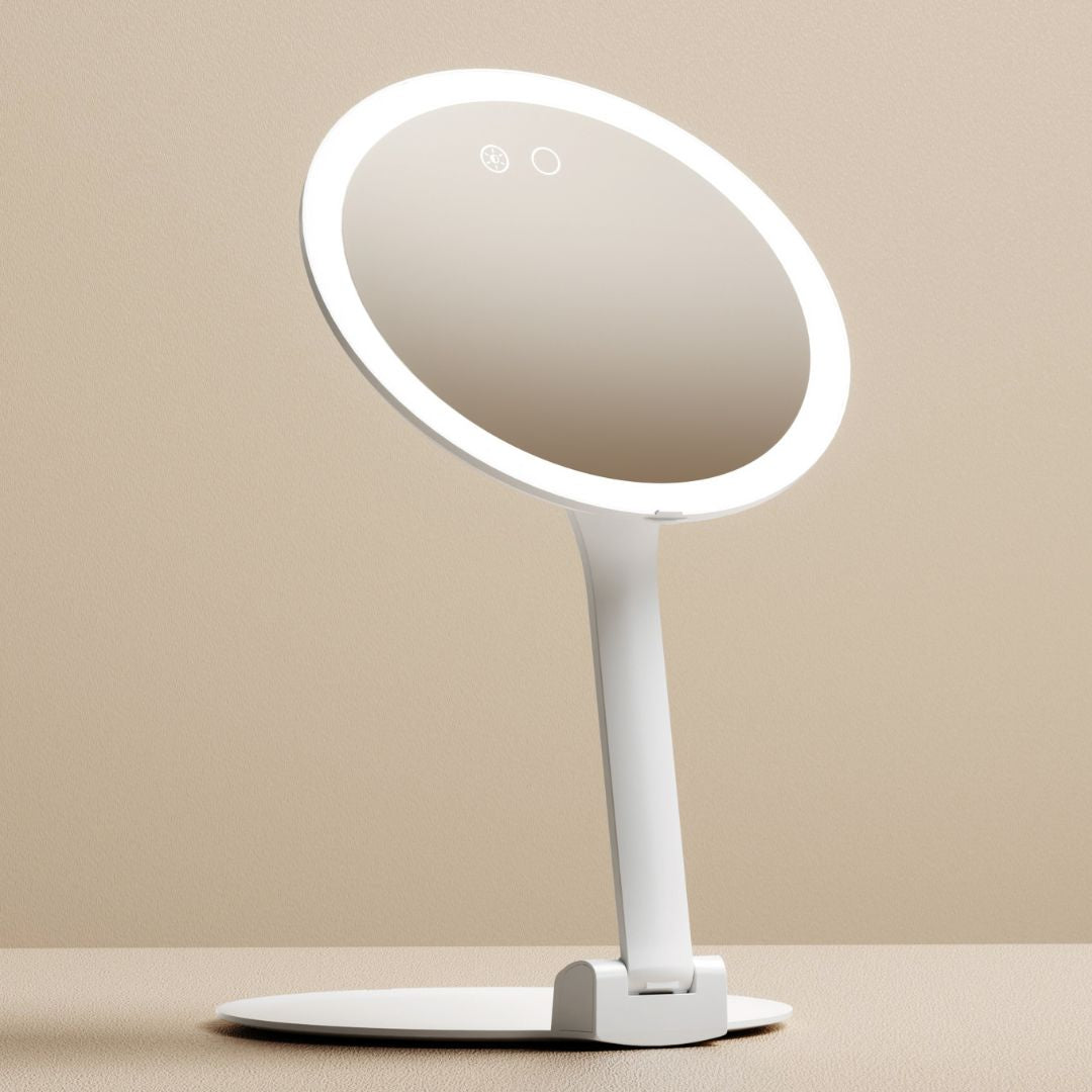 Abigail LED travel makeup mirror with 10x magnification, white portable vanity mirror with ring light and folding stand.