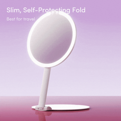 Abigail LED travel makeup mirror in white featuring a slim, foldable design with a circular lighted vanity ring.