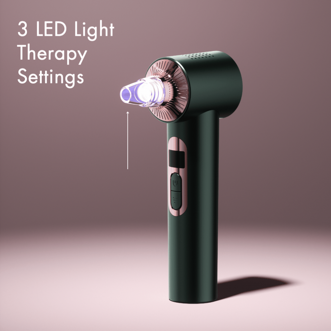 Clara Microdermabrasion Device with LED light therapy and pore vacuum head for blackhead removal.