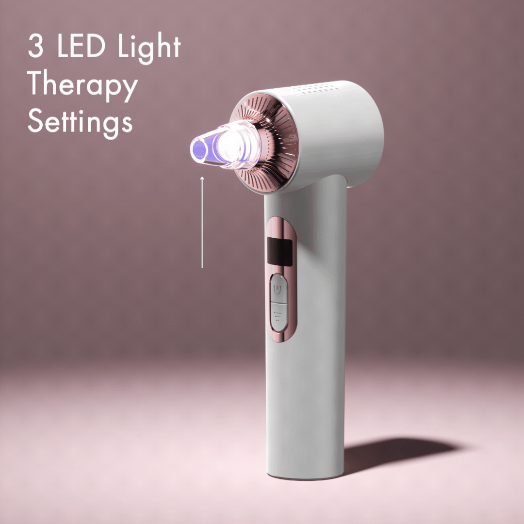 Clara pore vacuum and blackhead remover tool with blue LED light therapy for skin rejuvenation on pink background.