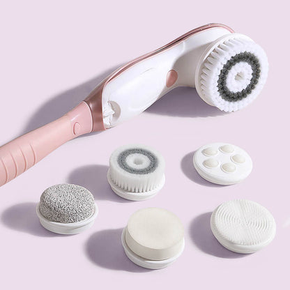 Cora 7 electric body cleansing brush set with detachable pink handle and six interchangeable exfoliating brush heads.