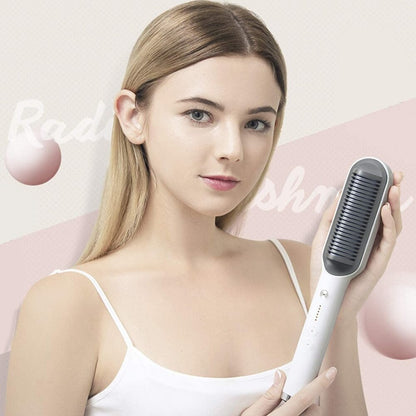 Woman with sleek hair holding a Revive Hair negative ion straightening comb with ceramic anti-scald design.