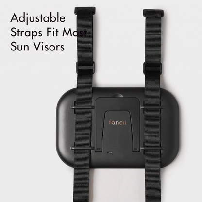 Juni 2 lighted car visor mirror back view showing adjustable mounting straps and built-in tabletop vanity stand.