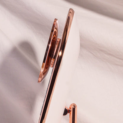 Side view of the Lara 10x magnifying mirror attachment magnetically secured to the Vera LED vanity mirror.
