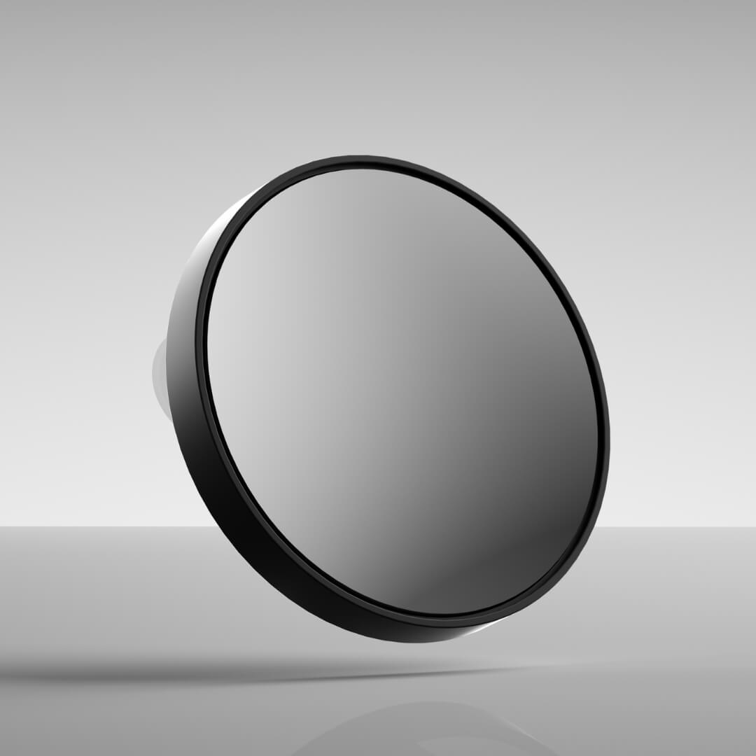 Tara 10x magnifying suction mirror in black for distortion-free detail, shown from a side angle.