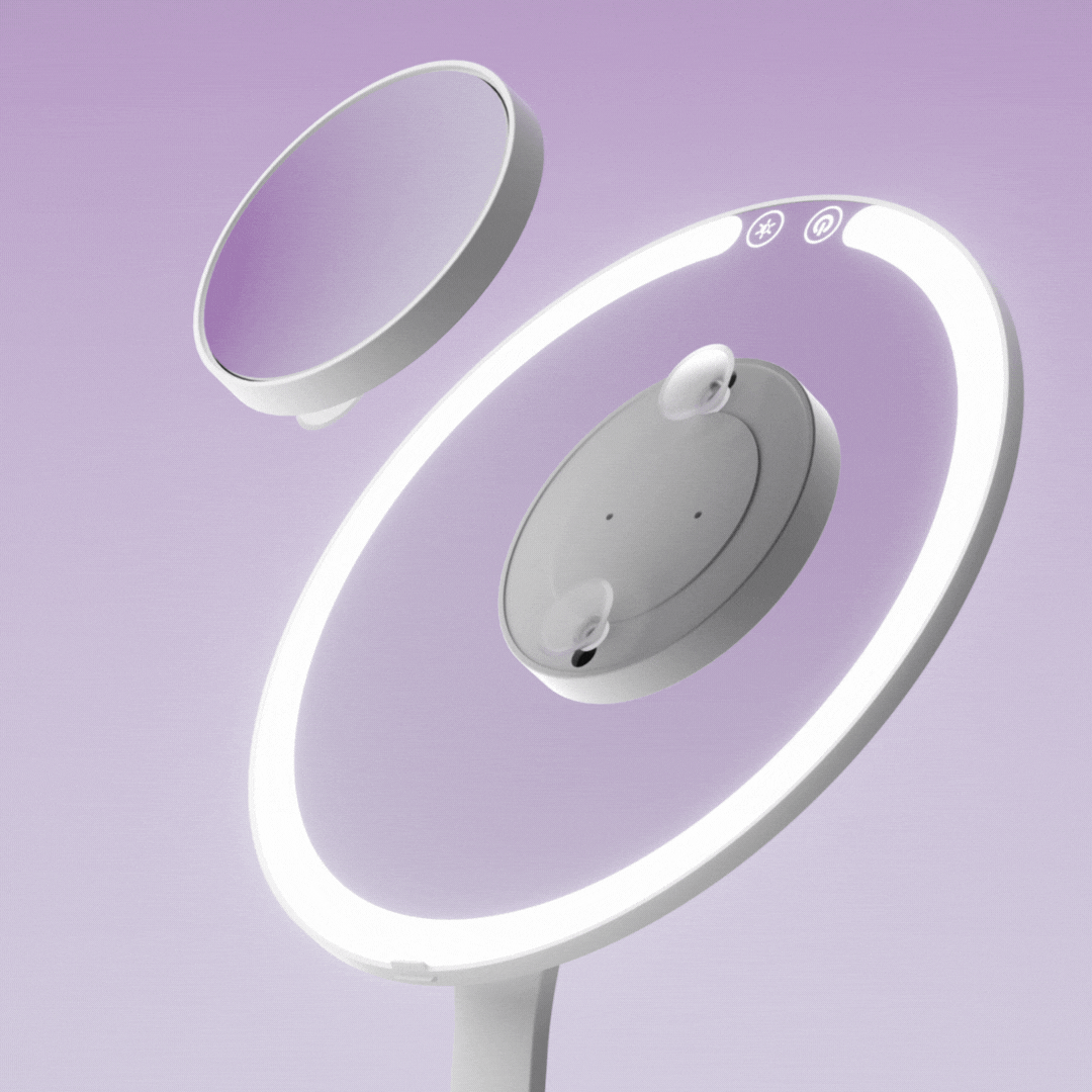 Abigail LED travel makeup mirror with detachable 10x magnification mirror showing suction cup mounting on purple background