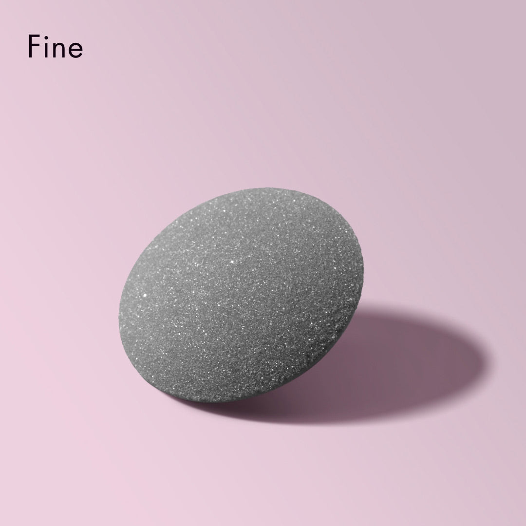 Cali Callus Remover Fine Grit Replacement Head for foot pedicure and smoothing, grey textured disc on pink background.