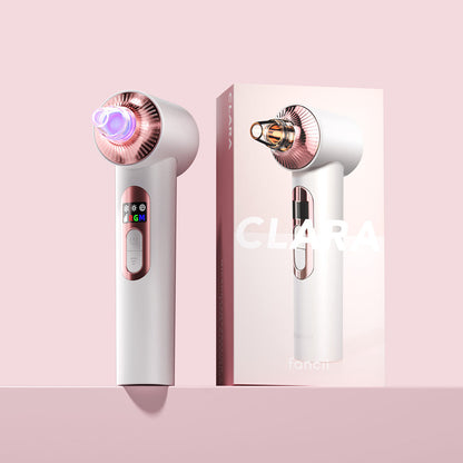 Clara 4-in-1 microdermabrasion device and blackhead remover with rose gold accents and LED light therapy, next to packaging.