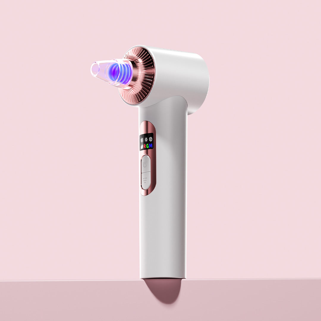 Clara Microdermabrasion Device: White and rose gold pore vacuum with blue LED light for blackhead removal and exfoliation.