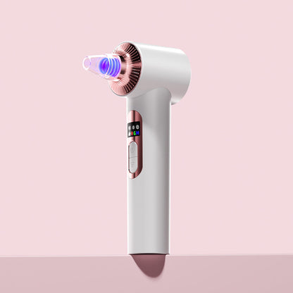 Clara Microdermabrasion Device: White and rose gold pore vacuum with blue LED light for blackhead removal and exfoliation.