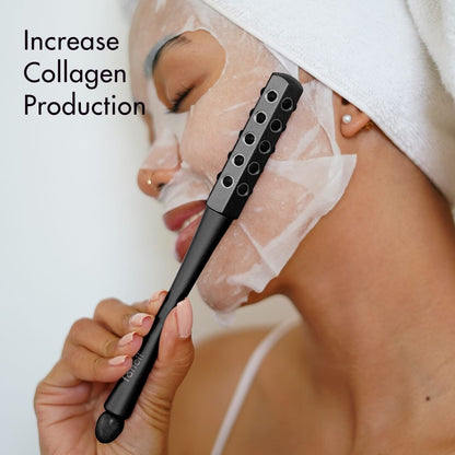 Remi Uplift facial roller with germanium stones used over a sheet mask to increase collagen production.
