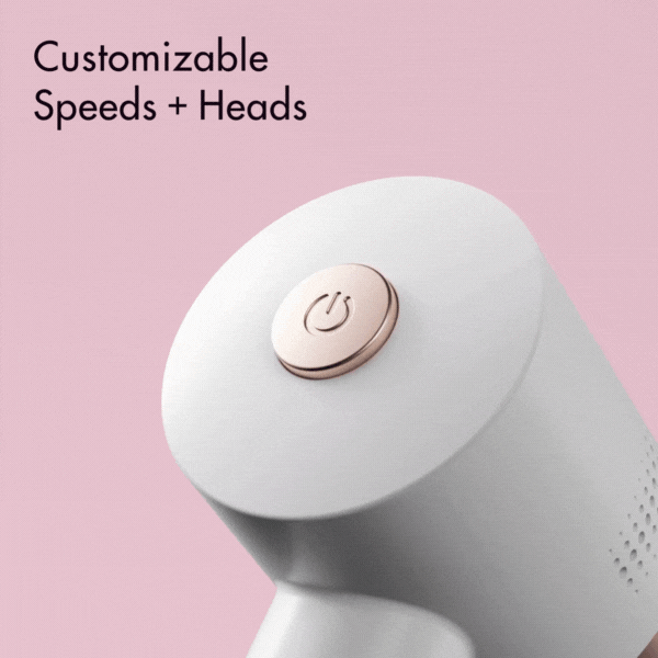 Cali Electric Callus Remover with customizable speeds and power button on a pink background.