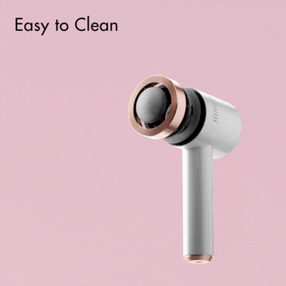 Cali Electric Callus Remover with easy-to-clean detachable rose gold head and white ergonomic handle on pink background.