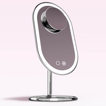 Vera LED vanity mirror in pink with magnetic 10x Lara magnifying mirror attachment and Tru Glow lighting system.