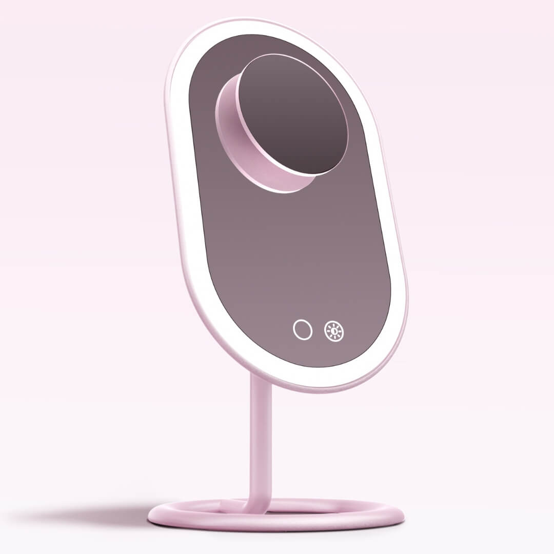 Vera LED lighted vanity mirror in pink with magnetic 10x Lara magnifying mirror and Tru Glow lighting system.